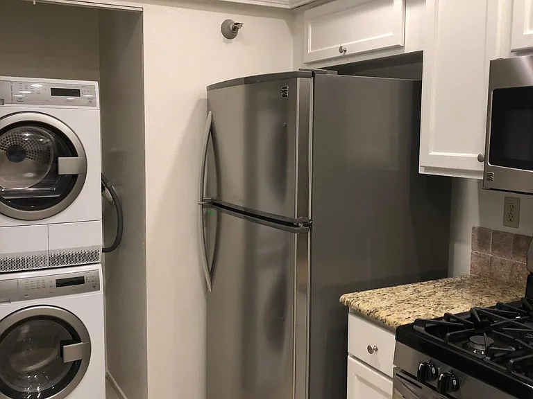 Refrigerator and washer/dryer included