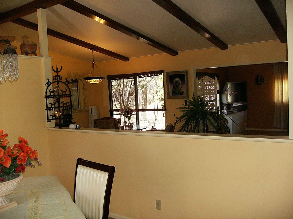 Wood Beams accent open floor plan