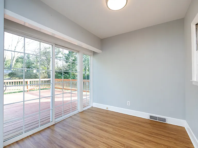 PATIO W/ DECK, ACCESSIBLE VIA KITCHEN