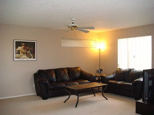 Living Room... new carpet and tile throughout