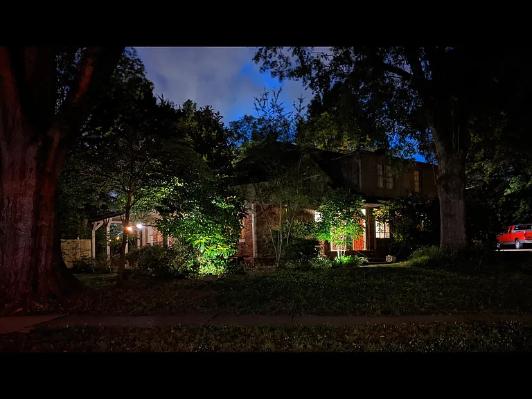 The Kenwood House from the Street at Night. All outdoor Landscaping lights are solar-powered (no electricity cost )