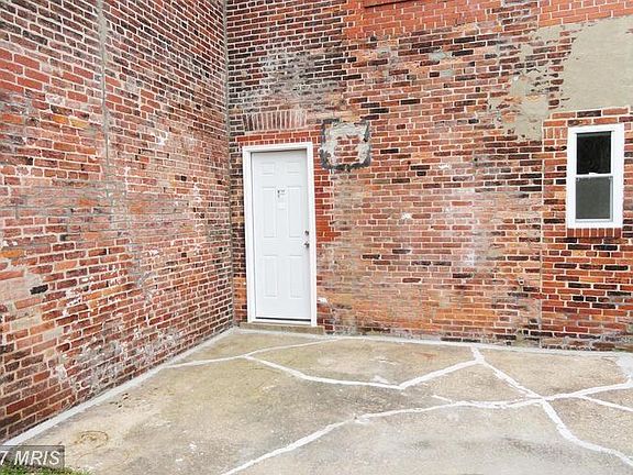 Patio Outside Kitchen, Picture Taken From Grass Lawn
