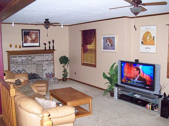 Living room w/ remote fireplace, this big screen Sony can be yours
