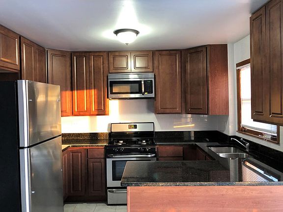 42 inch cabinets and stainless-steel appliances. Granite counter-tops.