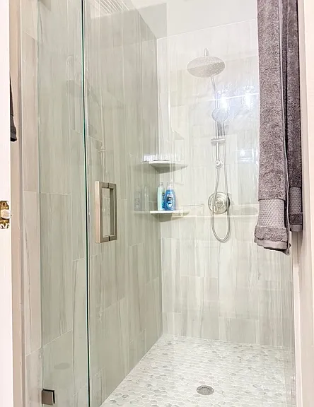 Main bathroom step in shower