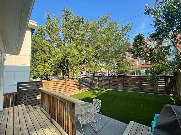 Deck overlooking front yard, facing E Union St