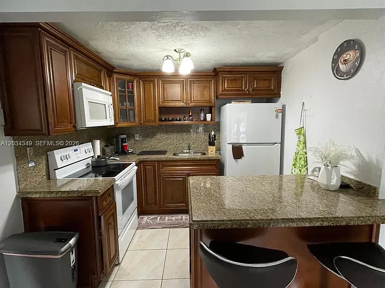4275 NW South Tamiami Canal Dr #2-111 — Photo 2