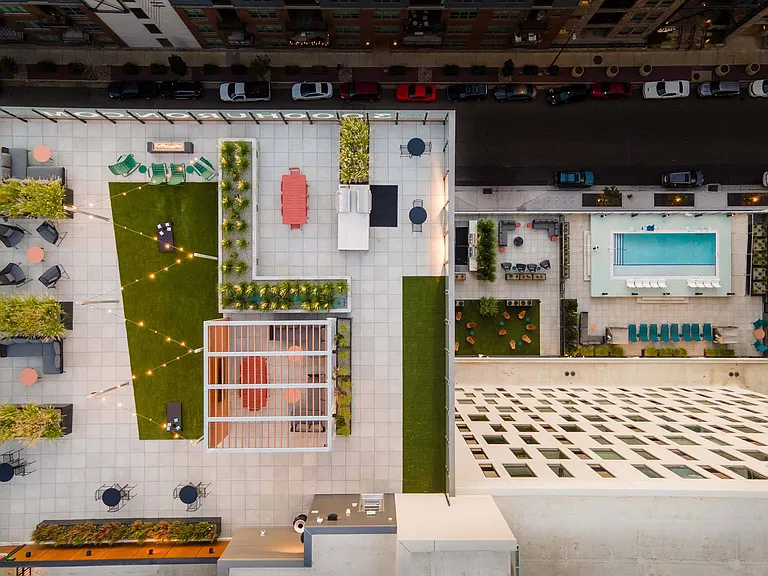 Enjoy the charm of two patios, one with a refreshing pool and ample seating for outdoor comfort.