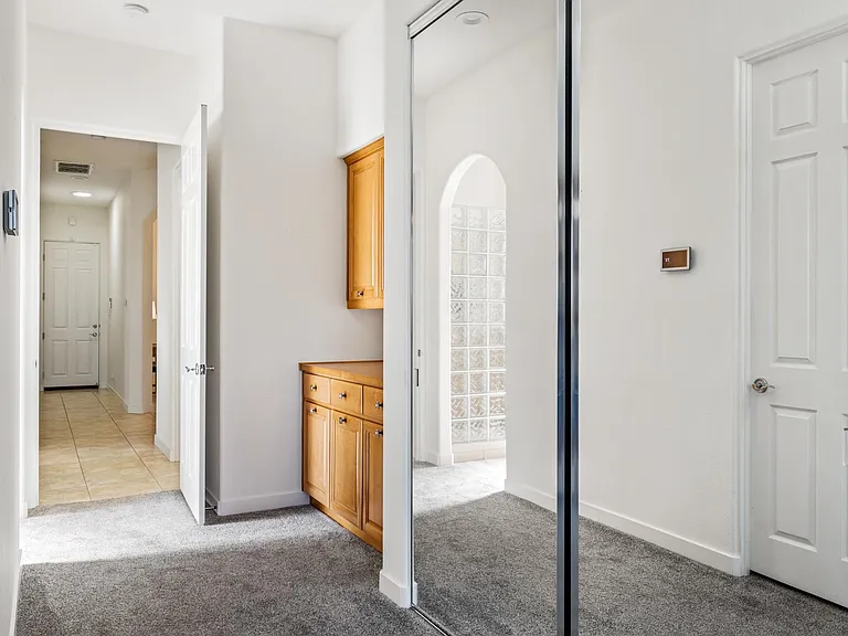 Master bedroom closet and storage area (walk-in closet across but not seen in pic)