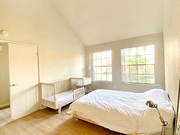 Master Bedroom with high vaulted ceilings and lots of natural light