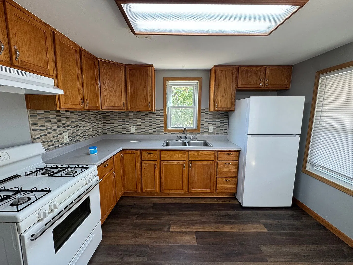 Updated 2-Bedroom Home in Moline | Huge Fenced Yard, Garage & Screened Patio — Photo 4