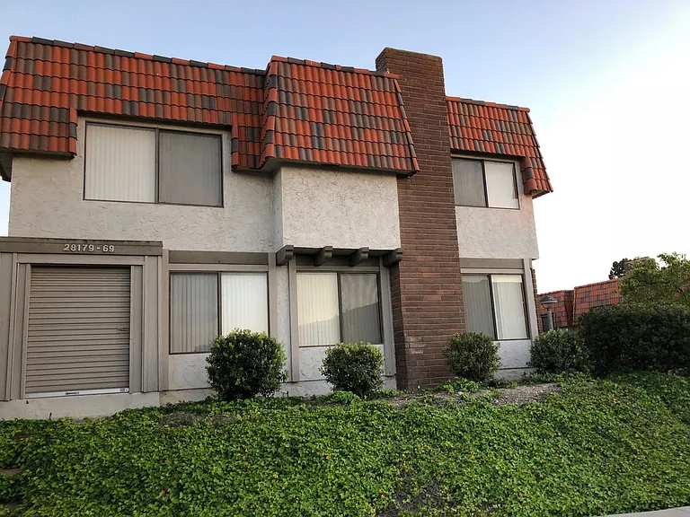 End unit, one shared wall with city views
