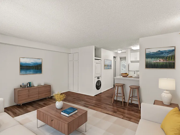 Spacious, open-concept living with a breakfast bar and in-home laundry_perfect for everyday comfort.