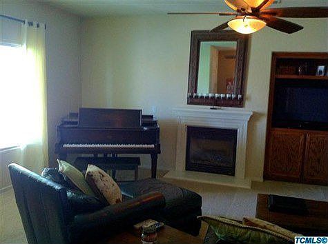 Nice size living room with fire place