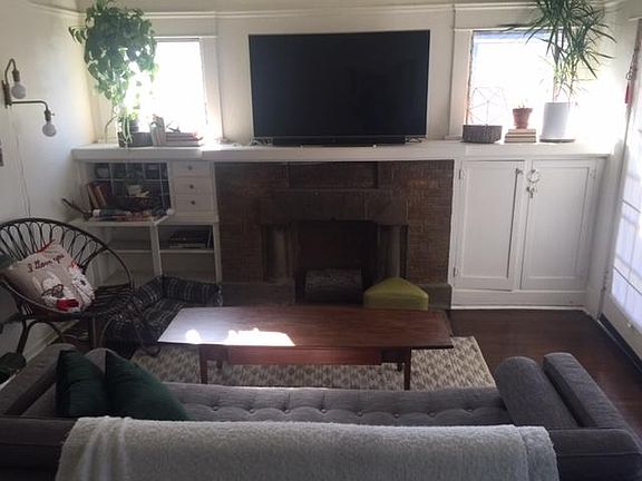 Relax in your new family room with plenty built in storage and a walk-in closet..... be careful, the couch could put you to sleep in this quiet neighborhood.