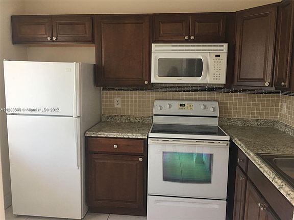 2nd image of 8610 N Sherman Cir APT 302