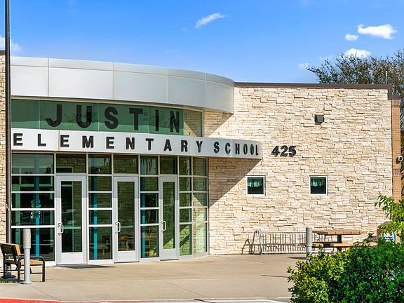 Adjacent to Justin Elementary School