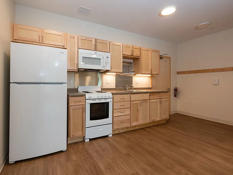 Village Center Apartments — Photo 13