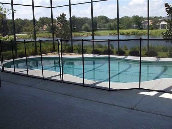 Pool with view of lake
