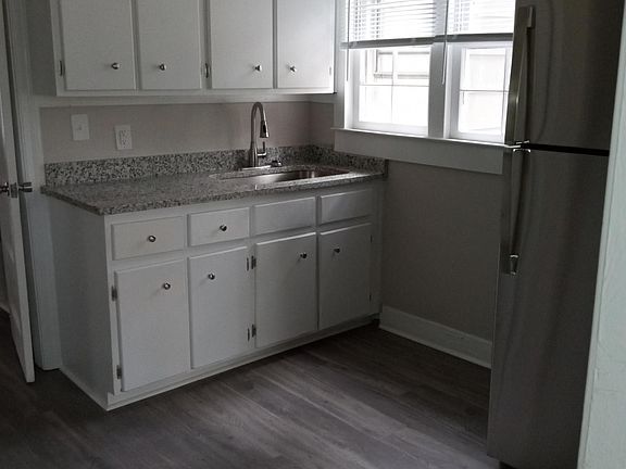 Updated kitchen w/ big window overlooking Beautiful large backyard.
