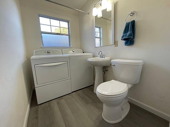 Half bath, laundry room. Washer and dryer are only a few years old and in perfect condition.