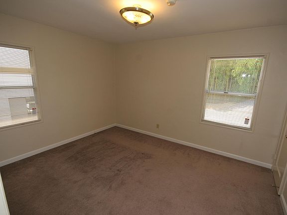 Bedroom with 2 windows