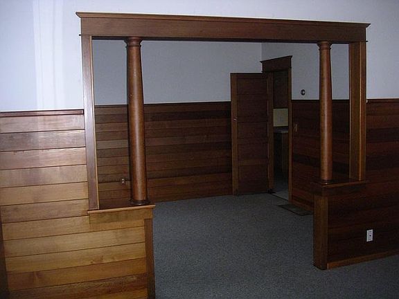 View from living room to dining room. Floor are now wood, no carpet.