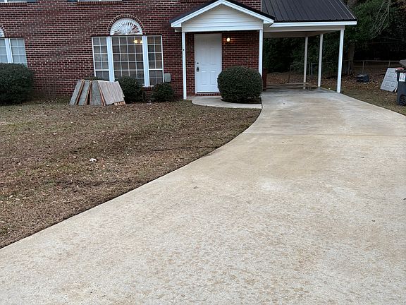 Long driveway and covered parking