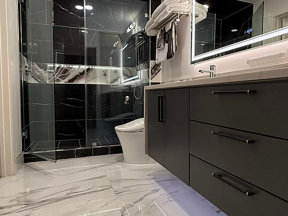 Large 2ft x 4ft tiles
Levantina Casablanca Quartzite from single slab.
Floating vanity with custom cabinets with smart phone \ digital assistant controlled Govee LEDs
