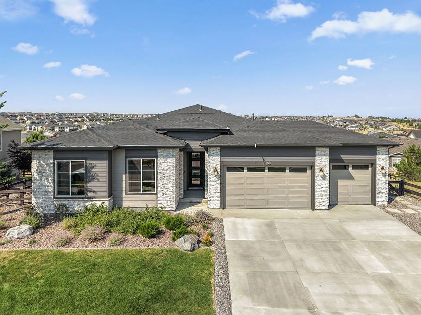 Front Exterior with 3-Car Garage