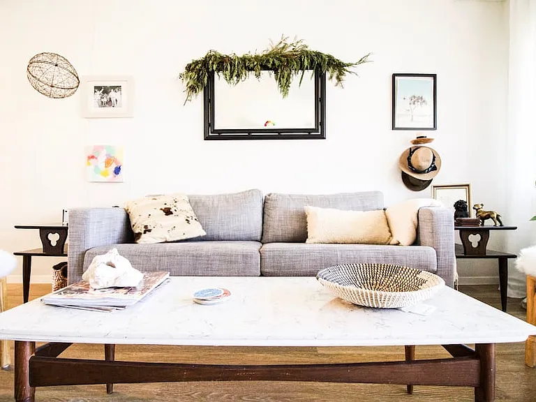 This is the 1st living space. When entering the home this is the first space you walk into. It has high vaulted ceilings, a large picture window and can be used as a formal living room, TV room or dining area.