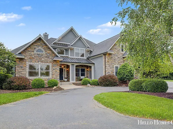 5327 Canyon River Dr NE, Ada, MI 49301