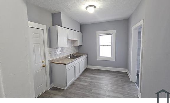 5th image of 3430 E 119th St #Up