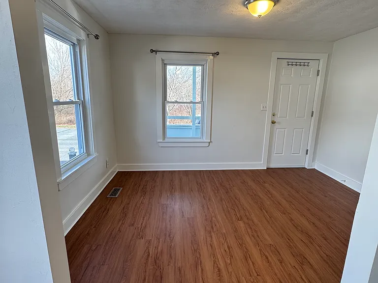 Living room overlooking front porch and quiet park