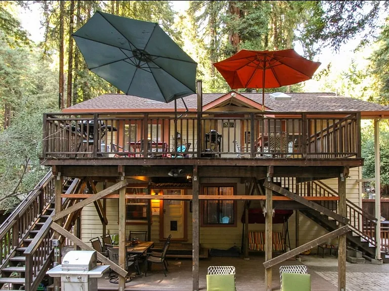 Entire building, this unit is top level with green umbrella. Has a private deck that you see in the picture with a divider between next door. Unit also has a private yard for a dog in the back.