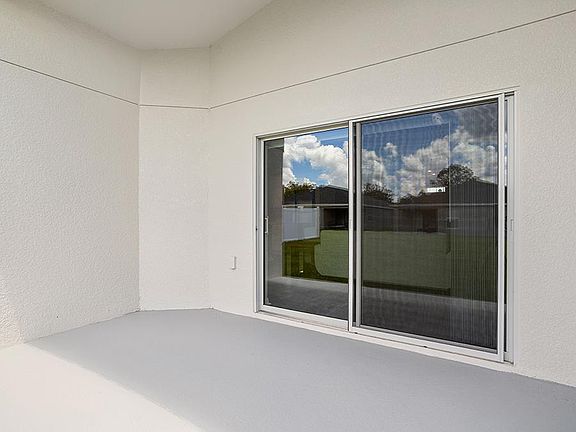 Your interior opens to desirable outdoor living space on a covered lanai.