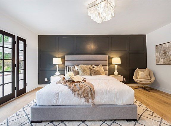 Master suite with custom wood wall