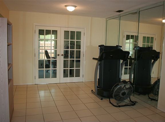 Separate Dining Room with French Doors leading to office or 3rd Bedroom