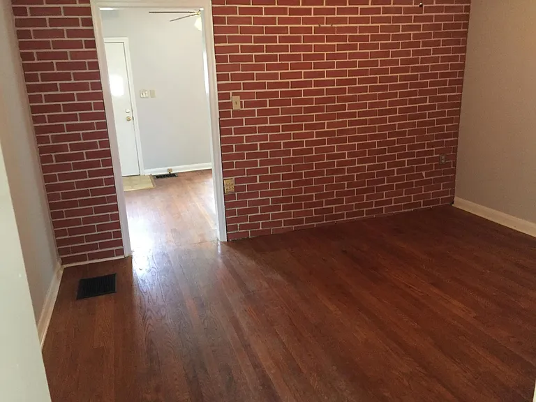 Exposed brick wall adds charm.