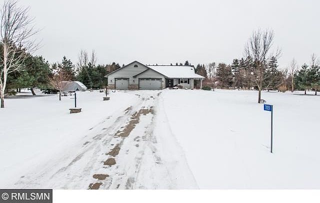 Heated floor garage with sink, drain, steps to attic storage space, concrete driveway. 30 x 40 garage.