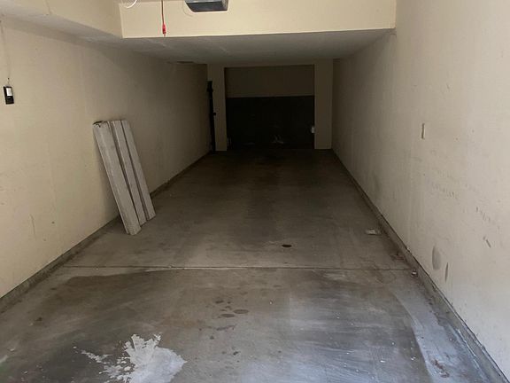 Garage. 2 Cars + 1 Motorcycle. + lot of space in the back for storage
