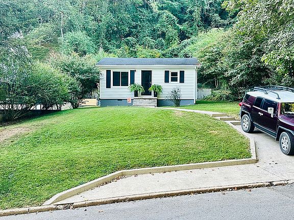 Parking & concrete walkway