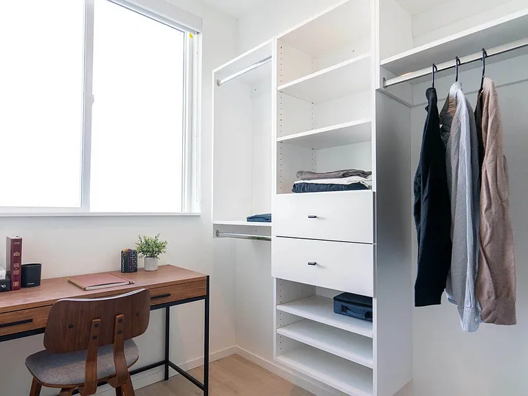Spacious closet with desk