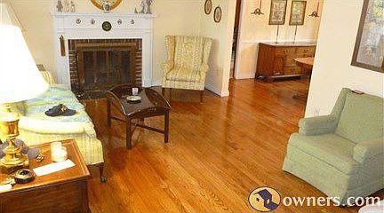 living room with partial view of dining room