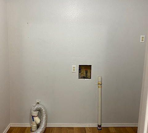 Laundry room off of the kitchen area.