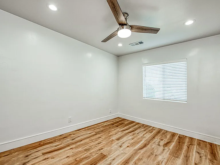Bedroom: TV Mount & Ceiling Fan, LED Lighting, LVP Flooring, Central Heating & Cooling, New Windows.