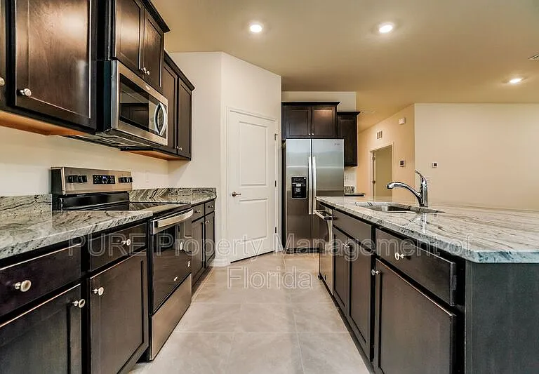 4122 NW 48th Terrace Rd — Photo 14