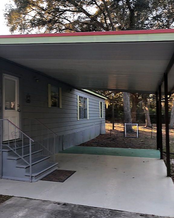 Main entrance & carport