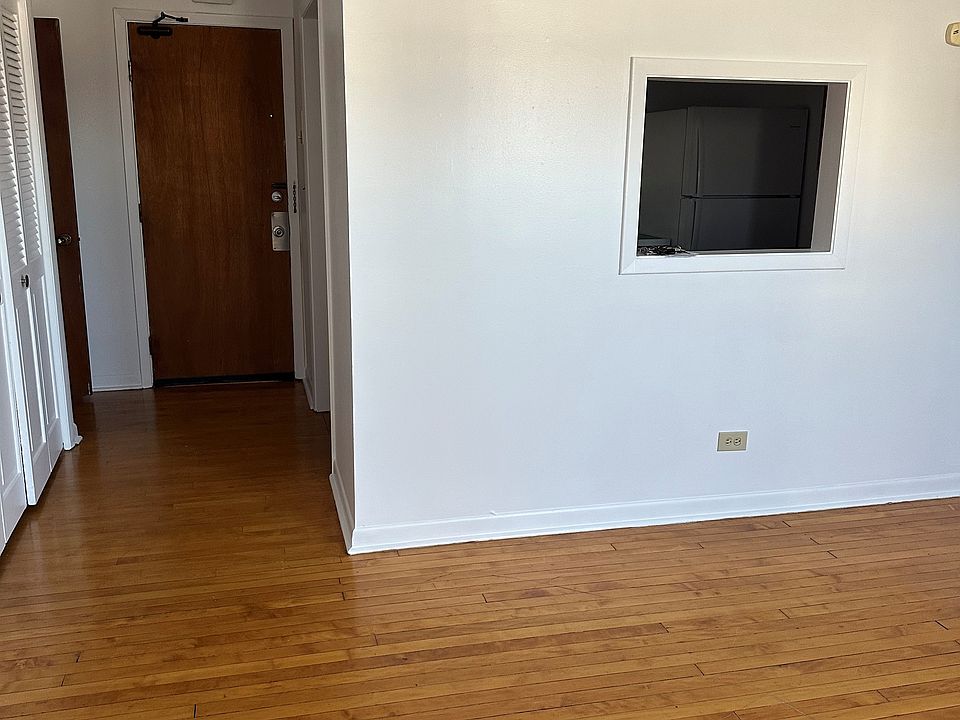 Looking at entry way and the kitchen