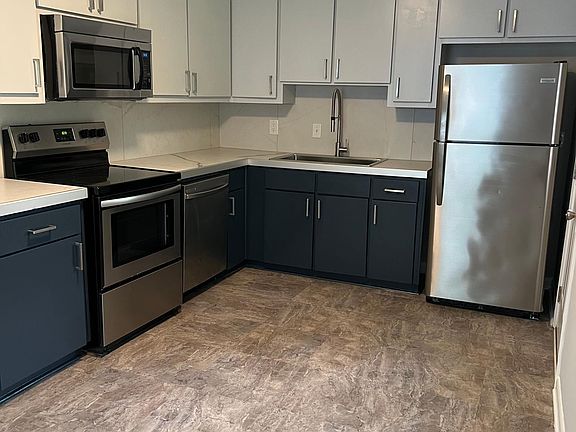 Kitchen with stainless steel appliances, all within 2 years new